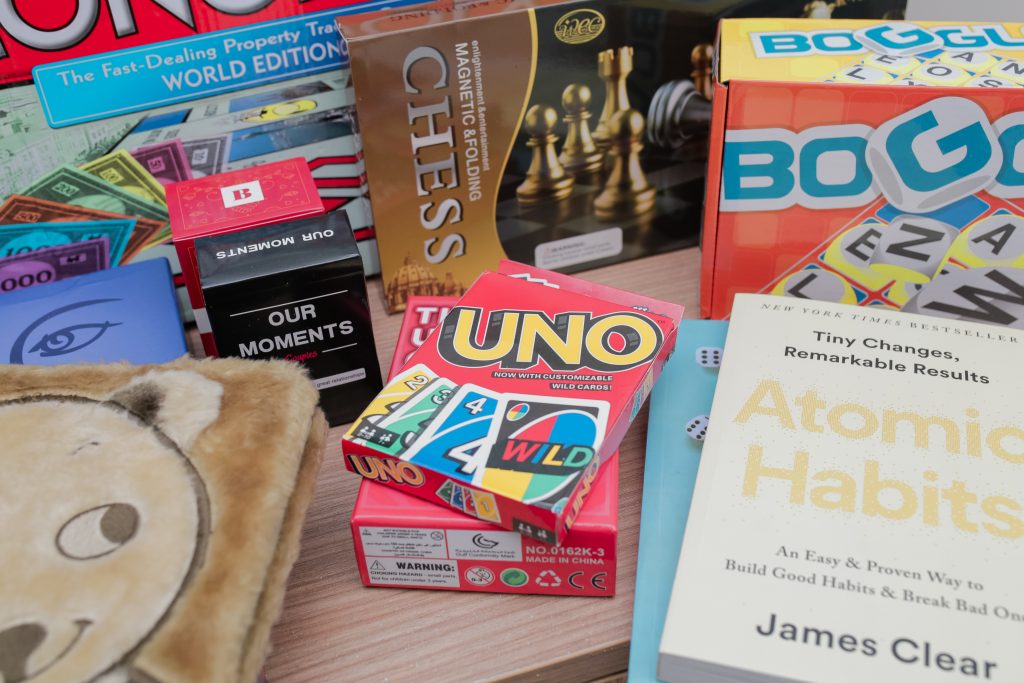 The different card and board games as part of the amenities. As well as children and inspirational books.